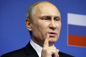 Russian President Putin speaks at a news conference after an EU-Russia Summit in Brussels