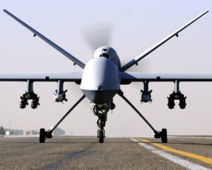 epa02730638 A British Ministry on Defence handout photograph dated 01 February 2010 and released on 13 May 2011 showing a RAF Reaper UAV (Unmanned Aerial Vehicle) taxiing at Kandahar Airfiled, prior to a mission in the skies over Afghanistan. The British Ministry of Defence reported on 13 May 2011 that the Reaper UAV is armed with a full complement of two GBU-12 226kg (500lb) laser-guided bombs and four Lockheed Martin AGM-114P Hellfire air-to-surface missiles. The MQ-9 Reaper is a medium-to-high altitude, long endurance remotely piloted aircraft system. The MQ-9's primary mission is to act as an intelligence, surveillance and reconnaissance (ISR) asset, employing sensors to provide real-time data to commanders and intelligence specialists at all levels. EPA/Cpl STEVE BAIN ABIPP / BRITISH MINISTRY OF DEFENCE / HANDOUT MANDATORY CREDIT; CROWN COPYRIGHT HANDOUT EDITORIAL USE ONLY/NO SALES