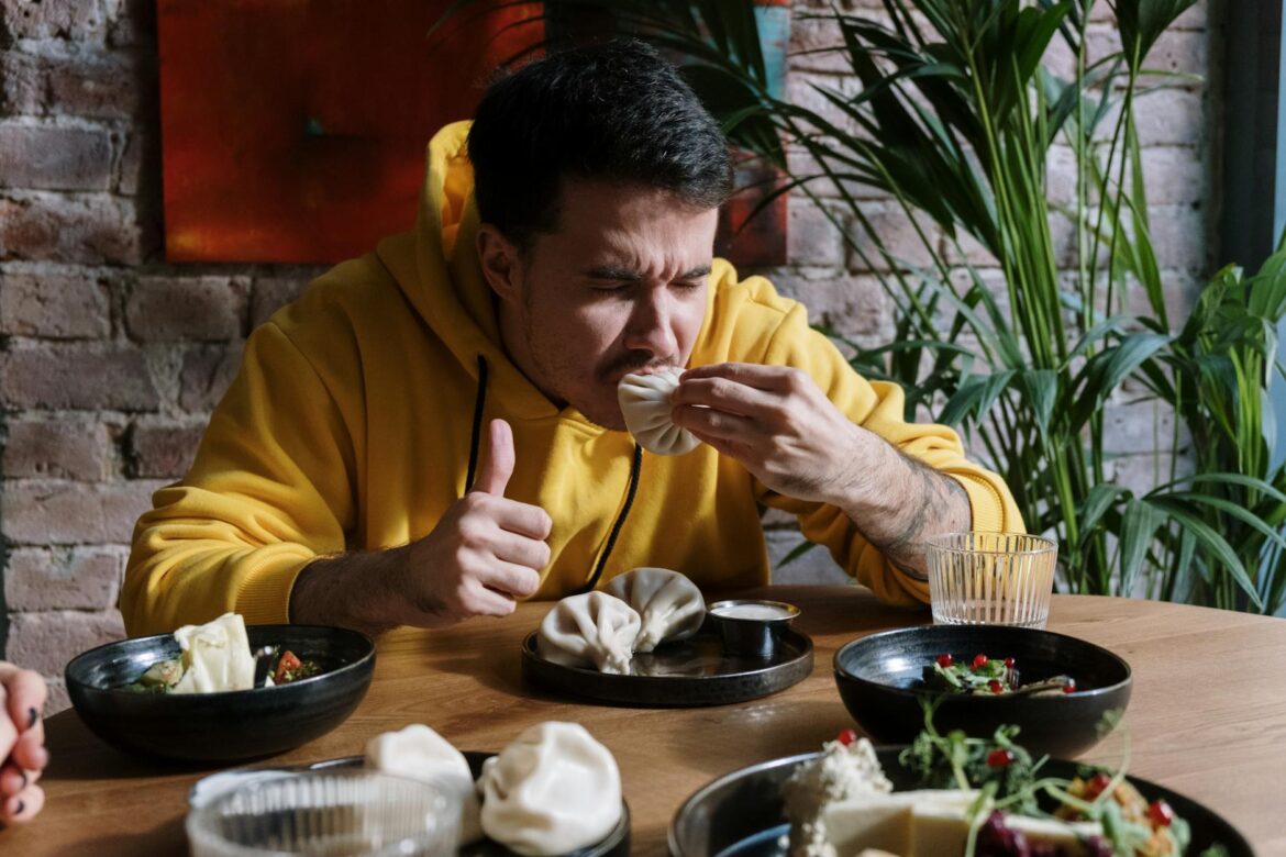 man eating khinkali