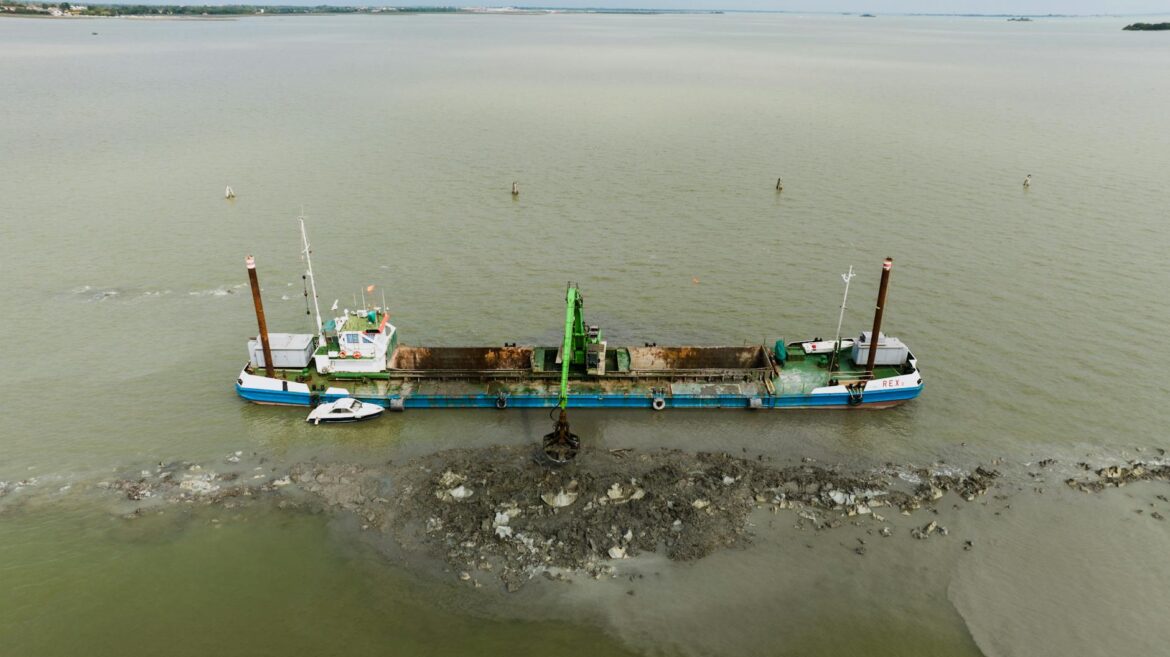 aerial view of dredging barge in venice lagoon