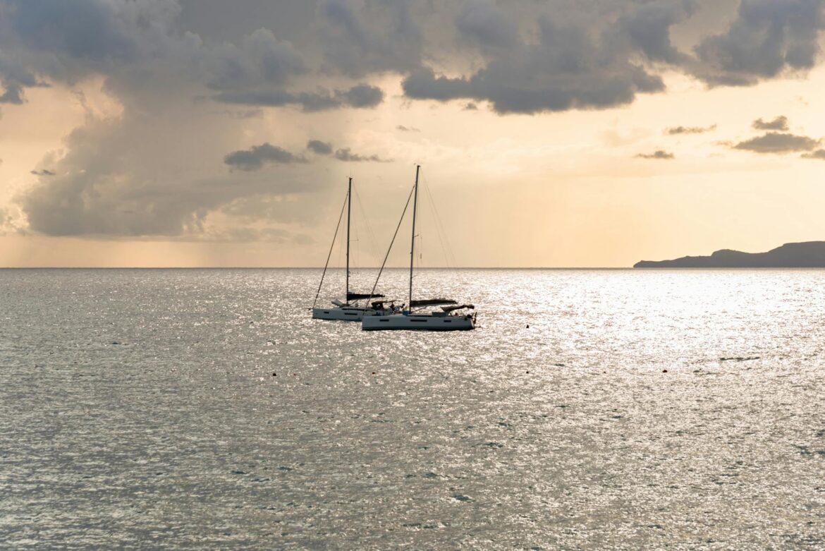 serene yacht sailing at sunset in maratea