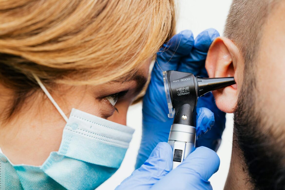 a doctor doing an ear examination