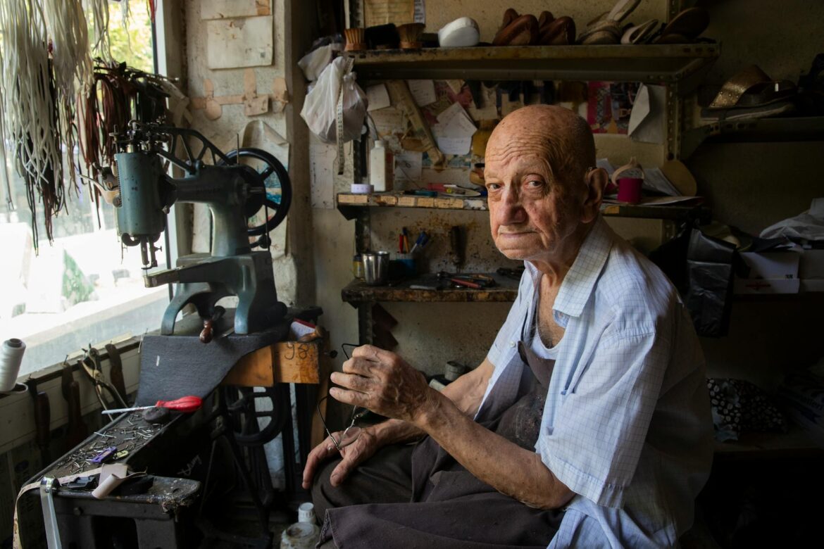 elderly man in a workshop